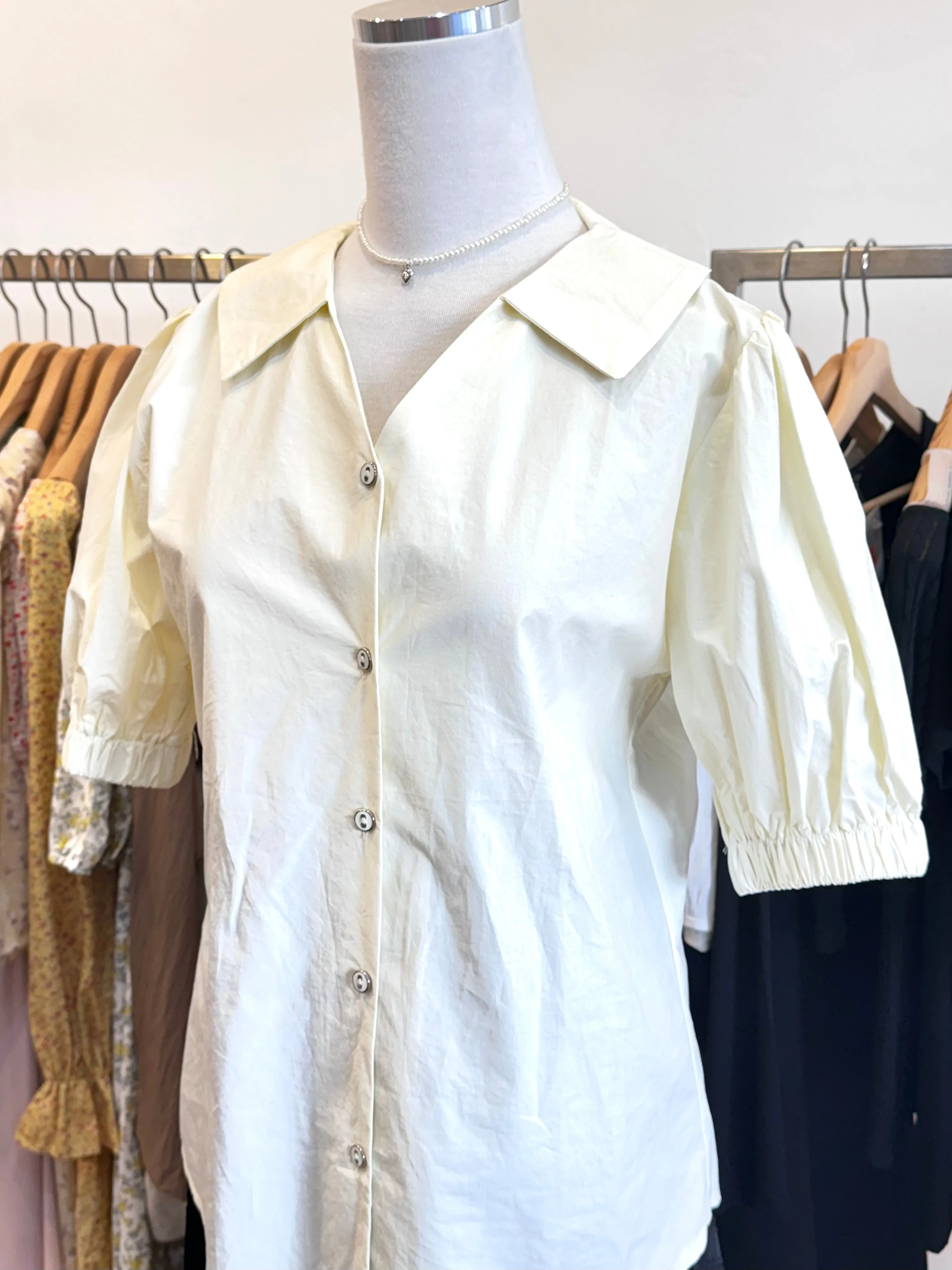 Cream short sleeve shirt