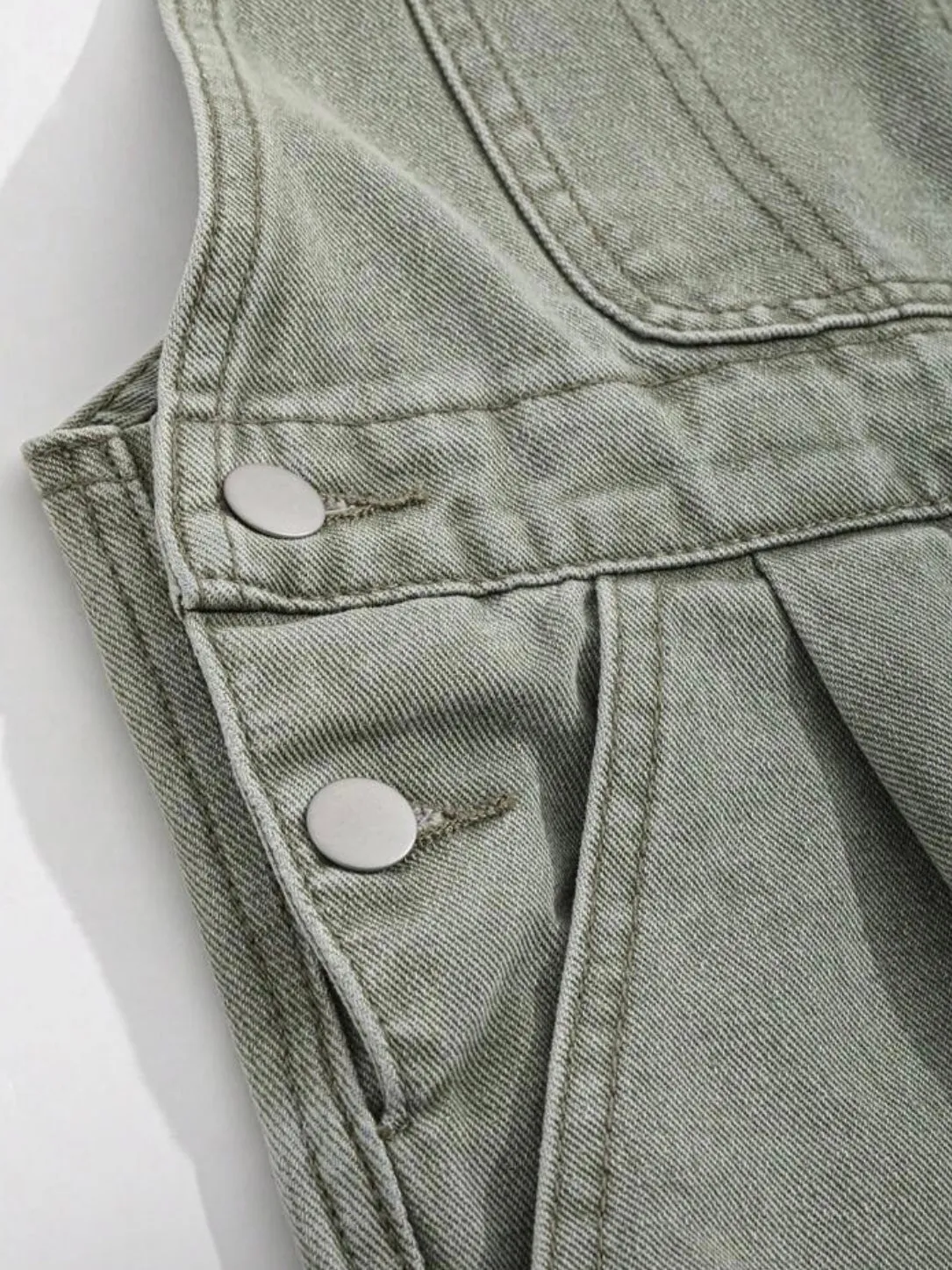 Light green jeans sleeveless jumper