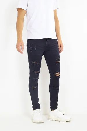 WASHED DENIM RIPPED FRONT SKINNY JEANS