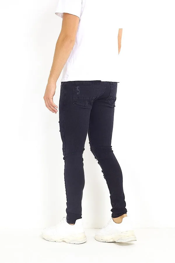 WASHED DENIM RIPPED FRONT SKINNY JEANS